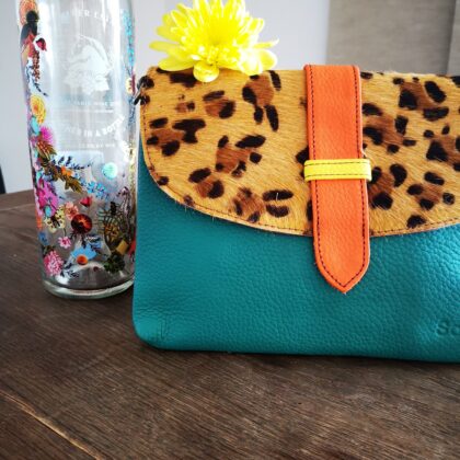 Clutch Türkis Leo Orange